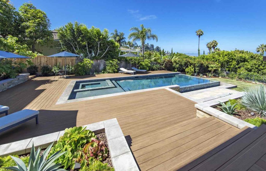 Composite deck with built-in pool & palm trees