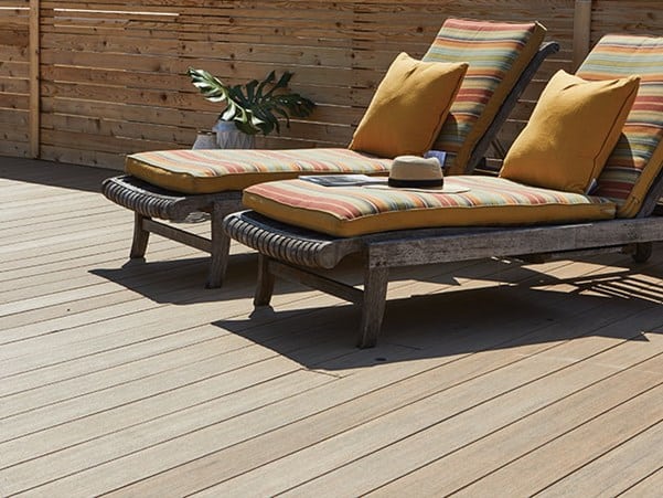 Deck featuring TimberTech AZEK Vintage Collection in Weathered Teak with outdoor chairs